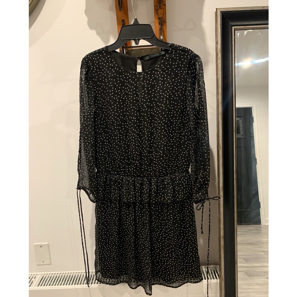 Black, double layered dress with white stars